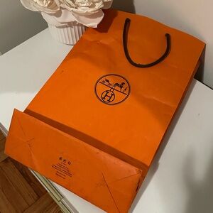 Hermès Orange Shopping Bag with Black Rope Handles